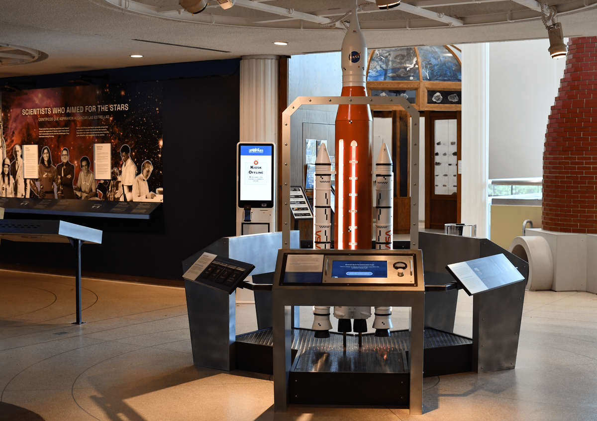 Rocketry museum exhibit with panel-mounted Beetronics touchscreen stations.