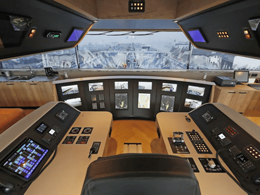 Ship bridge console with Beetronics marine displays integrated in panels.