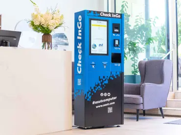 Compact hotel self-service check-in kiosk with Beetronics touchscreen, designed for 24/7 unattended operation.